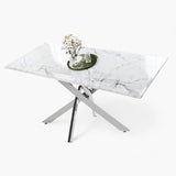 Laissez vous séduire par la table à manger rectangulaire en marbre blanc pieds argentés ALIA La table à manger en marbre blanc pieds argentés est une table avec 4 pieds